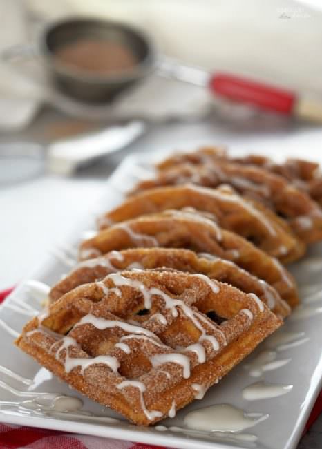 Pumpkin-Churro-Waffles, reminiscent of the popular street fair snack, are loaded with all the pumpkin and warm spiced flavors of fall with crisp, cinnamon sugared edges and an interior texture that practically melts in your mouth.