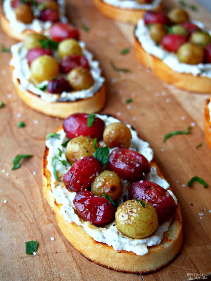 Roasted-Grapes-Crostini caramelizes sweet grapes with a light balsamic dressing before nestling them on a savory bed of ricotta and crisp, buttery toast. This is one appetizer to remember! 
