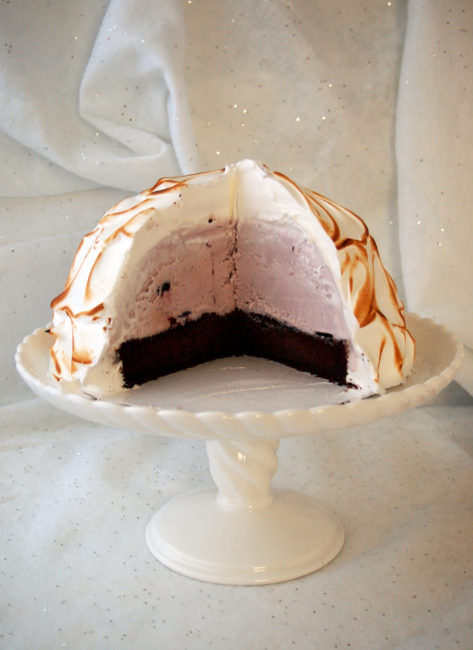 Baked-Alaska is made by encasing layers of tender cake and smooth ice cream in a silky meringue, and then toasting it in the oven. Baked Alaska is a fun and whimsical dessert that is as easy to make as it is impressive to serve.