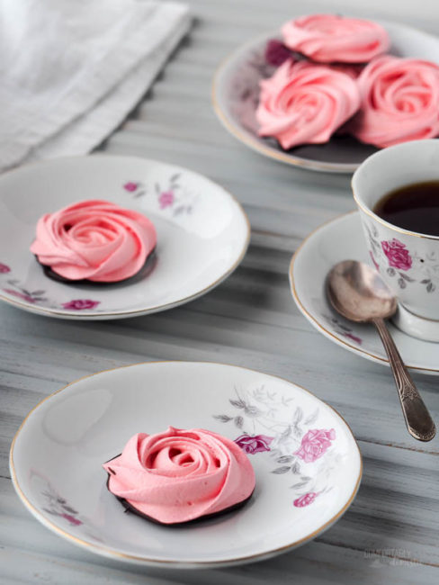 Rose-Meringue-Cookies are crisp, light, and airy cookies in the shape of sweet roses. A swirl through dark chocolate makes these low fat cookies a decadent treat!