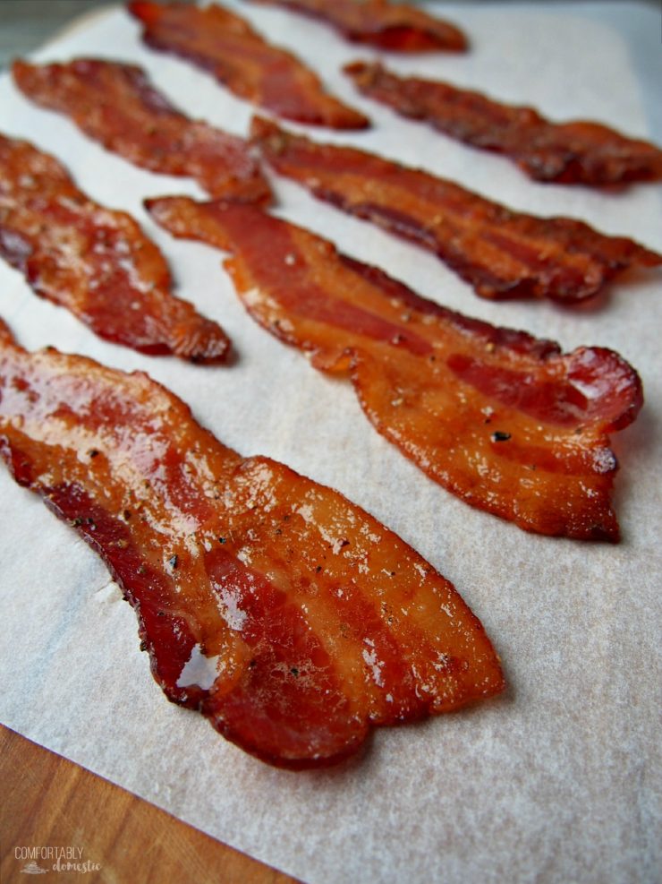 Candied Maple Bacon on parchment paper.