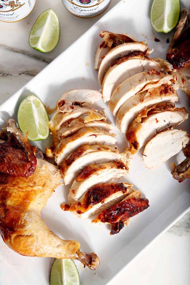 sliced-grilled-chicken-on a white platter