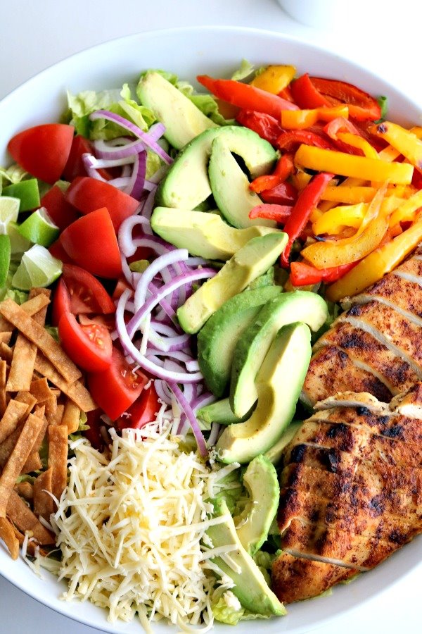 chicken-taco-salad with all ingredients grouped together charcuterie board style