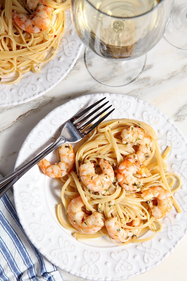 white-plate-of-lemon-pasta-with-shrimp