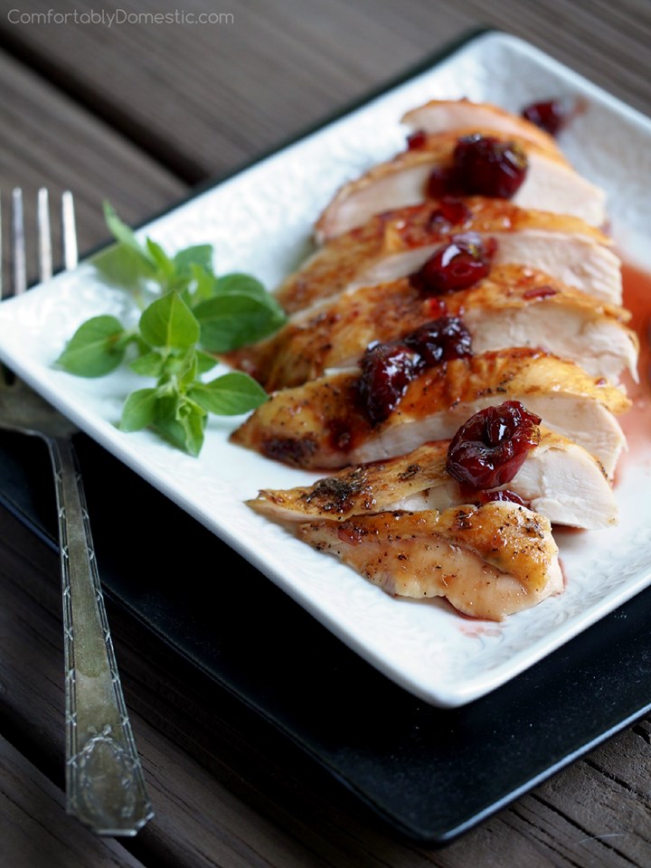 roasted-chicken-skin-on-breast with tart cherries on top.