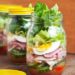 Chef Salad in a Jar - Crisp romaine lettuce, fresh vegetables, ham, turkey, egg, cheese, & a tasty parmesan vinaigrette dressing.